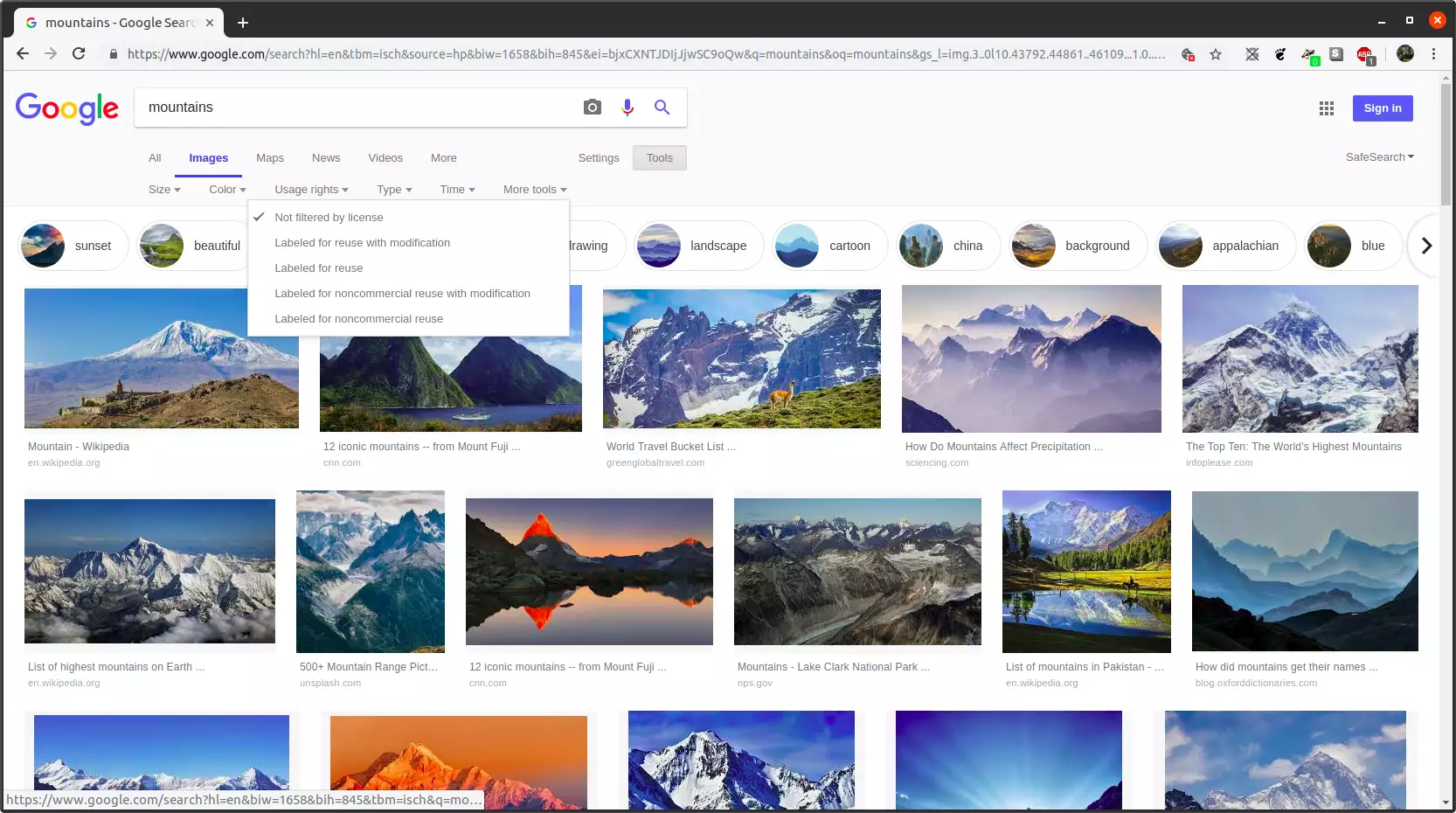 Google Images results page for the search term "mountain" with the Usage rights drop-down menu open