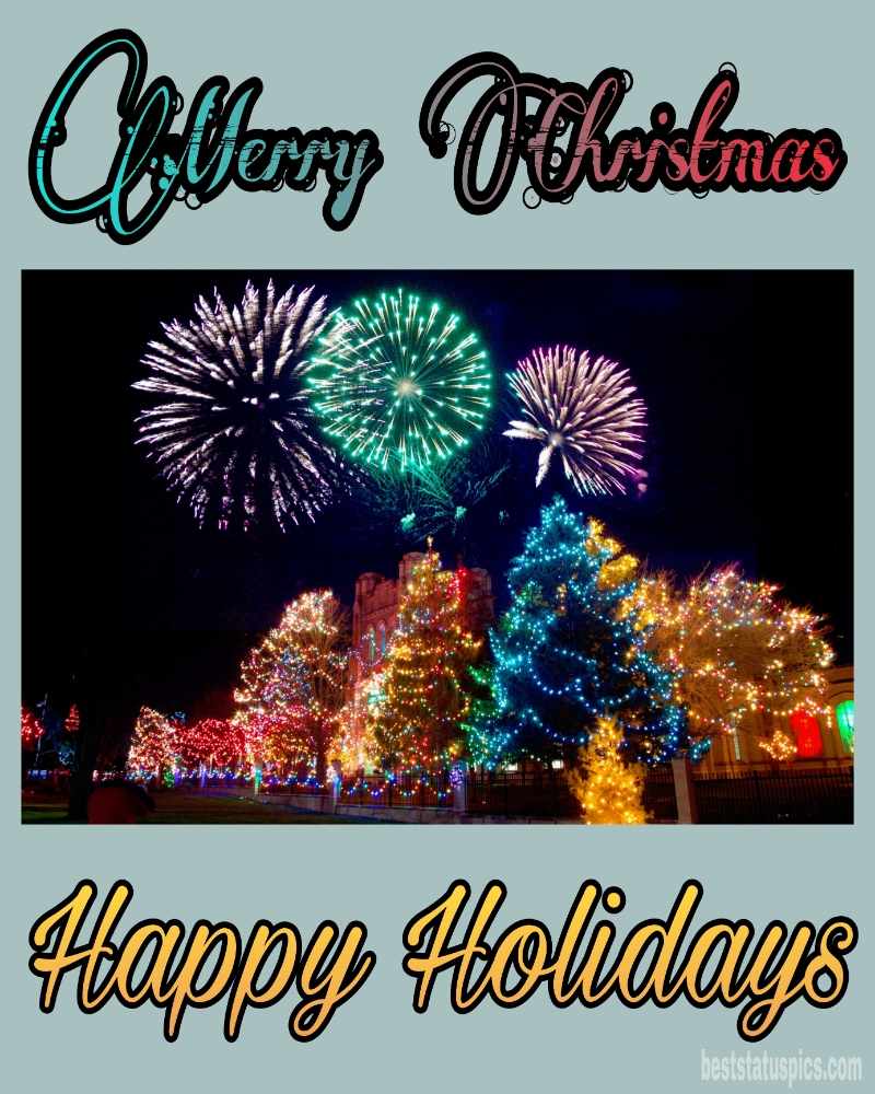 Buone vacanze Buon Natale 2022 auguri e foto HD con albero di Natale e fuochi d'artificio
