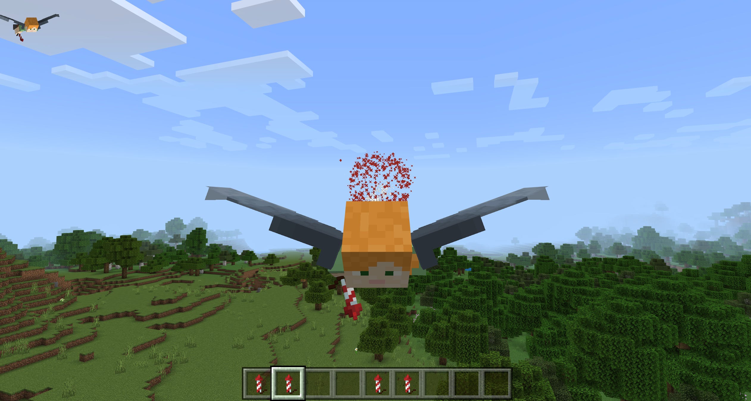 Un giocatore di Minecraft che vola usando l'oggetto Elytra, con un fuoco d'artificio che esplode dietro di loro.