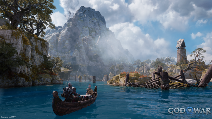 Kratos e Atreus navigano sull'acqua in God of War Ragnarok.
