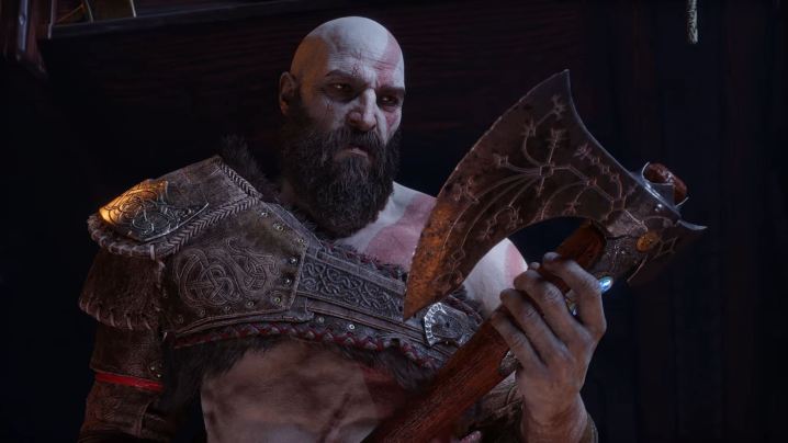 Kratos guarda l'Ascia del Leviatano.