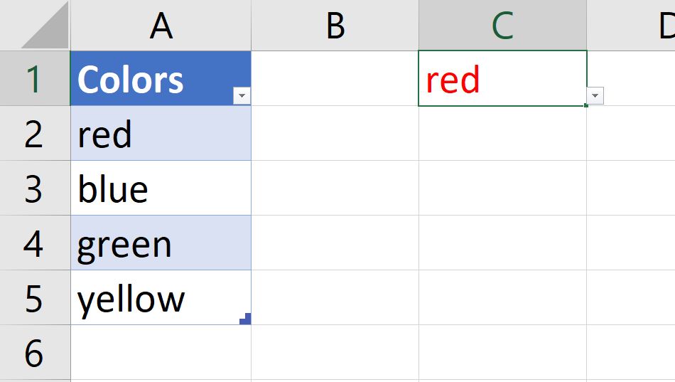 Una tabella in Excel con Colori, rosso, blu, verde e giallo elencati nella colonna A e la parola rosso in carattere rosso nella cella C1