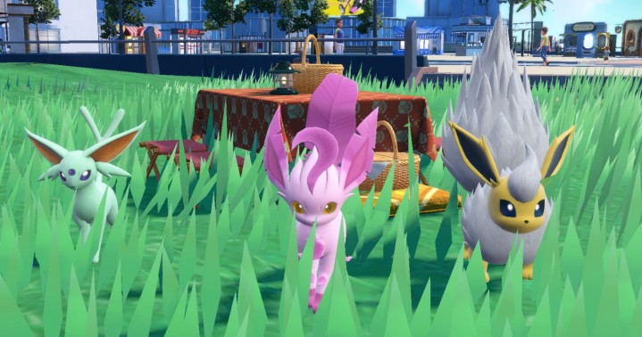 Tre Pokémon luccicanti durante un picnic.